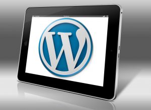 Wordpress Webseitenerstellung auf Tablet Logo
